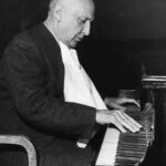 Dimitri Tiomkin playing piano