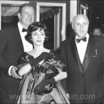 John Wayne, his wife Pilar, and Dimitri Tiomkin, 1960