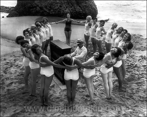 Albertina Rasch dancers on beach with piano