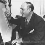 Dimitri Tiomkin composing, 1948