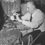 Dimitri Tiomkin examines Native American instruments for The Big Sky, 1951